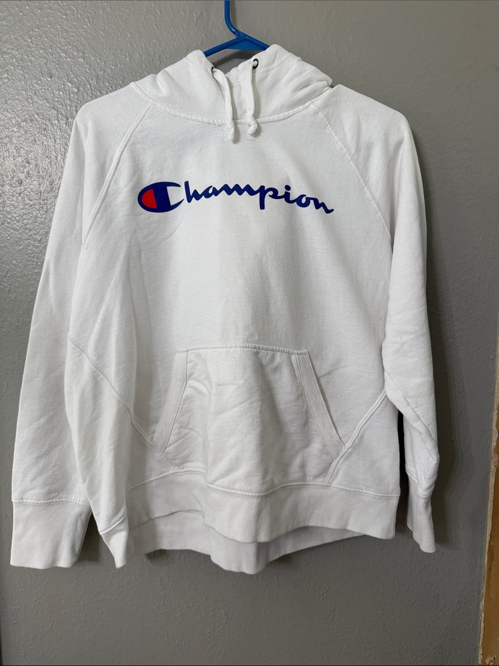 Champion White Pullover Hoodie with Blue Script and Red Emblem